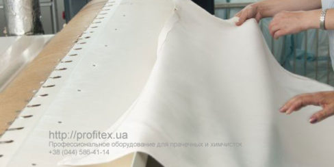 Гладильное оборудование в химчистке и аквачистке. Сеть химчисток АКВАТЕХ Итальянский бульвар, Украина, Одесса. На фото гладильная машина Miele Германия.