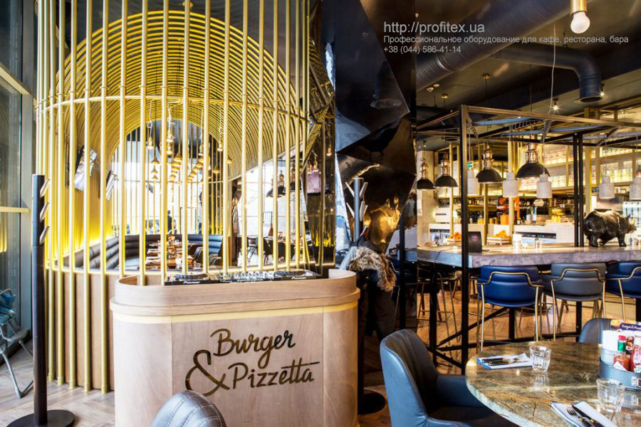 Профессиональное оборудование для кухни от PROFITEX. Ресторан Burger&Pizzetta. На фото интерьер зала ресторана.